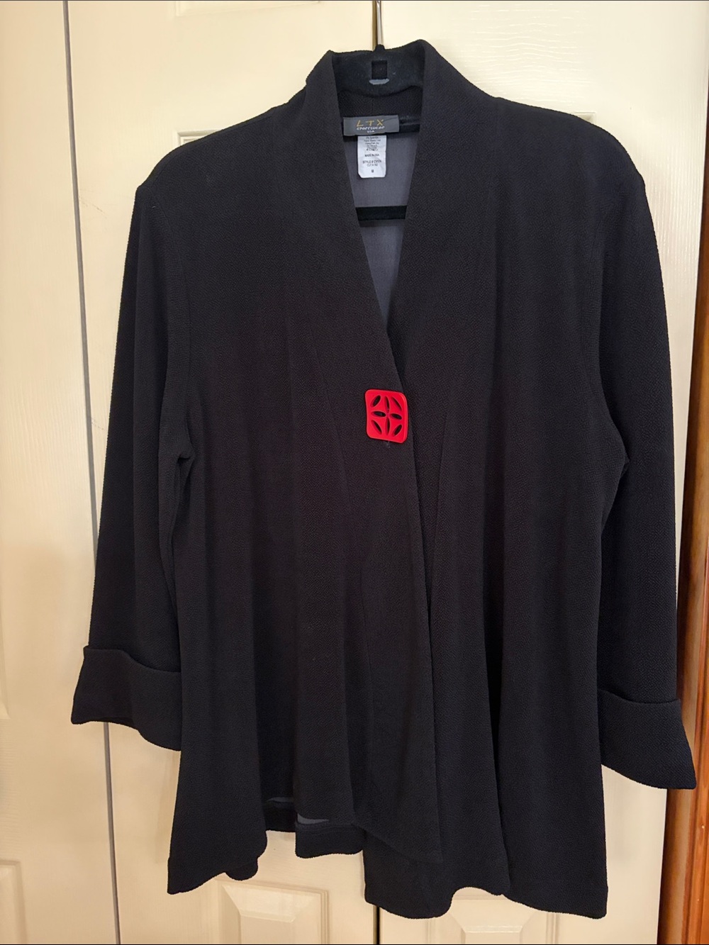 Black Open-Front Knit Jacket with Red Accent Button